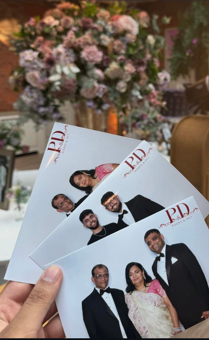 customised prints being held by a guest at a wedding event in birmingham