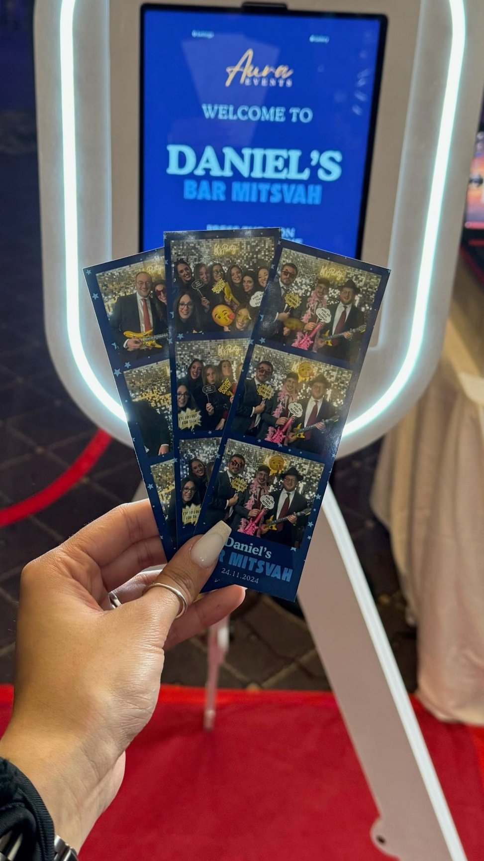 printed photo strips from a barmitsvah party in london featuring our selfie booth in the background